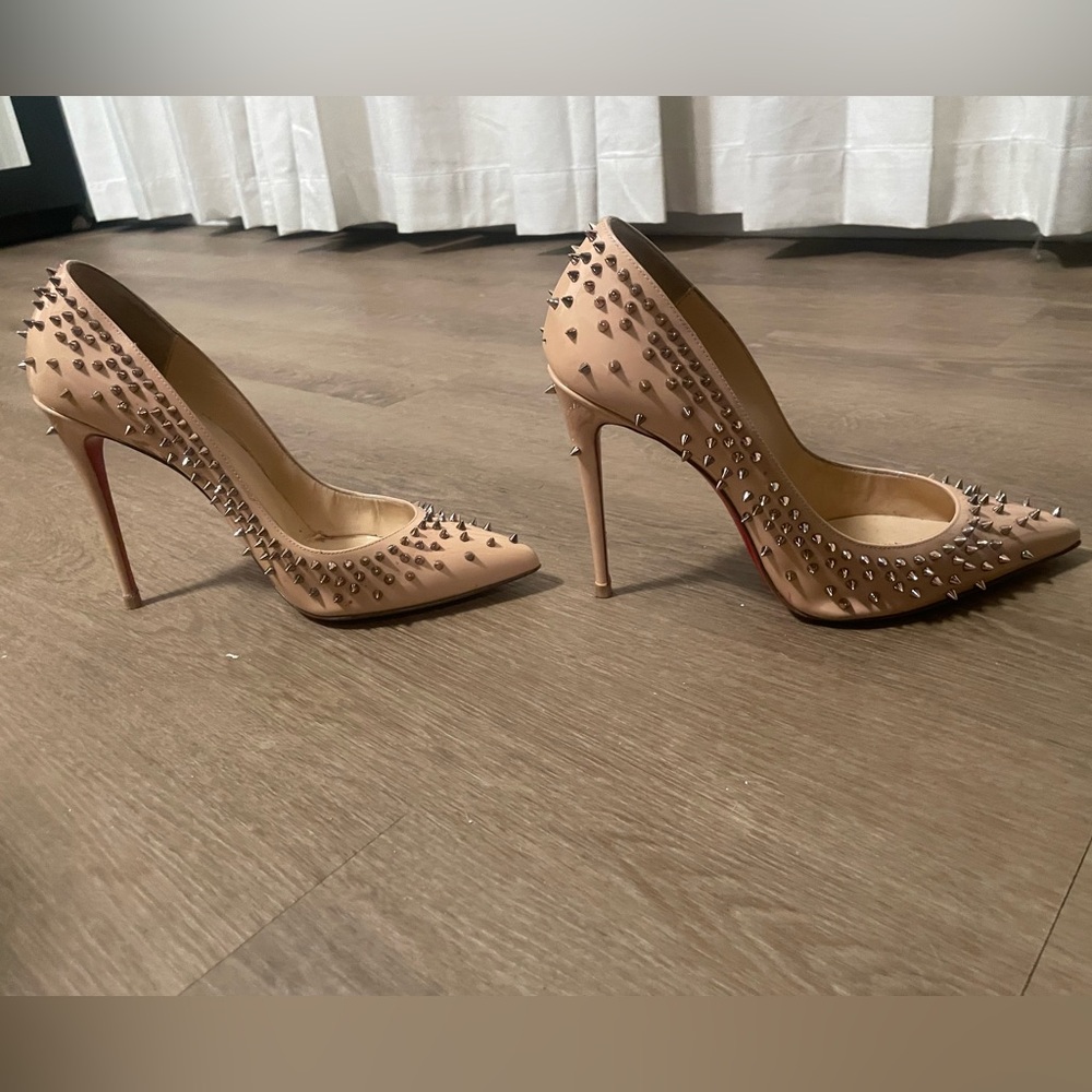 Christian Louboutin - red bottoms